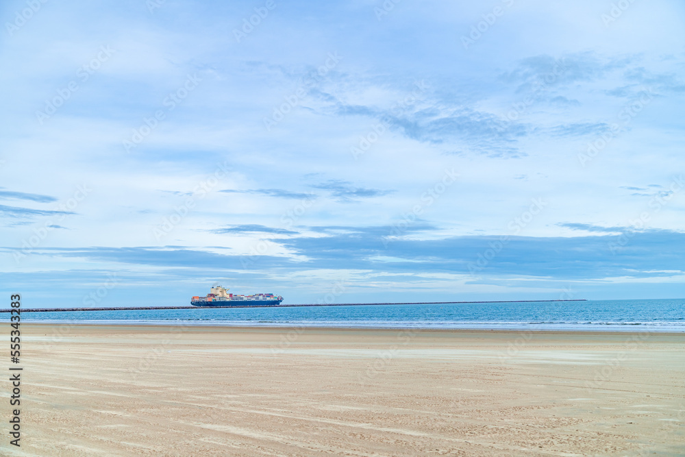 cargo ship at the sandy beach