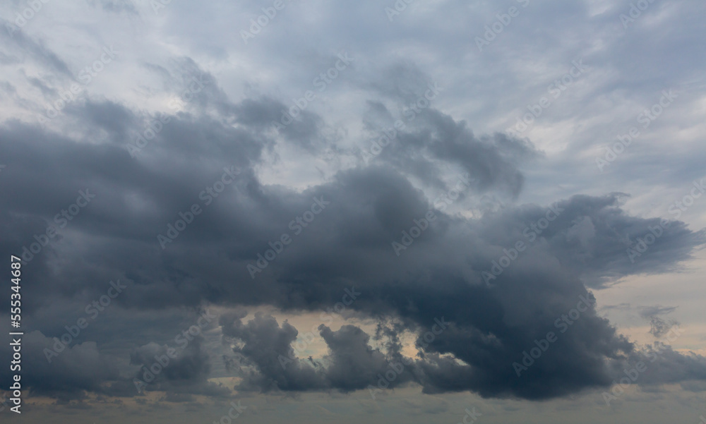 Fototapeta premium Murky summer sky covered with grey clouds. Nature in waiting for rain