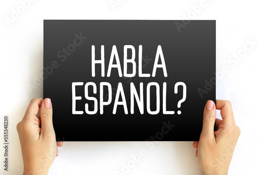 Habla Espanol? text on card, concept background photo