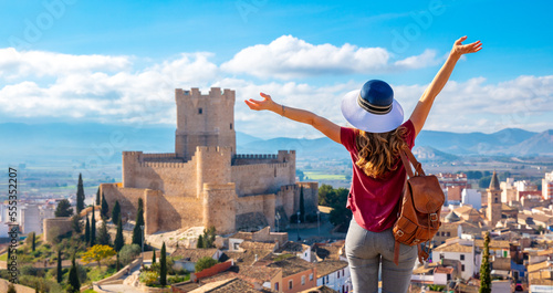 Atalya,Villena Castle in Costa Blanca Alicante Spain- woman tourist enjoying beautiful panoramic view