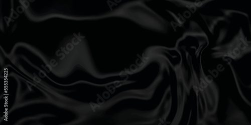 Black silk background . Black fabric background texture . abstract background luxury cloth or liquid wave or wavy folds of grunge silk texture material or smooth and soft luxurious  curve.