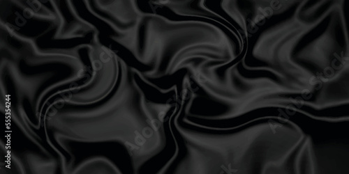 Black silk background . Black fabric background texture . abstract background luxury cloth or liquid wave or wavy folds of grunge silk texture material or smooth and soft luxurious .