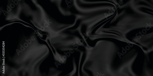 Black silk background . Black fabric background texture . abstract background luxury cloth or liquid wave or wavy folds of grunge silk texture material or smooth and soft luxurious .