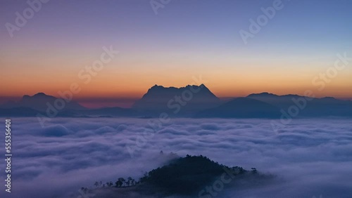 Majestic view of Doi Luang Chiang Dao in northern Thailand, the third highest mountain in Thailand, seen with beautiful dramatic clouds and colorful sky