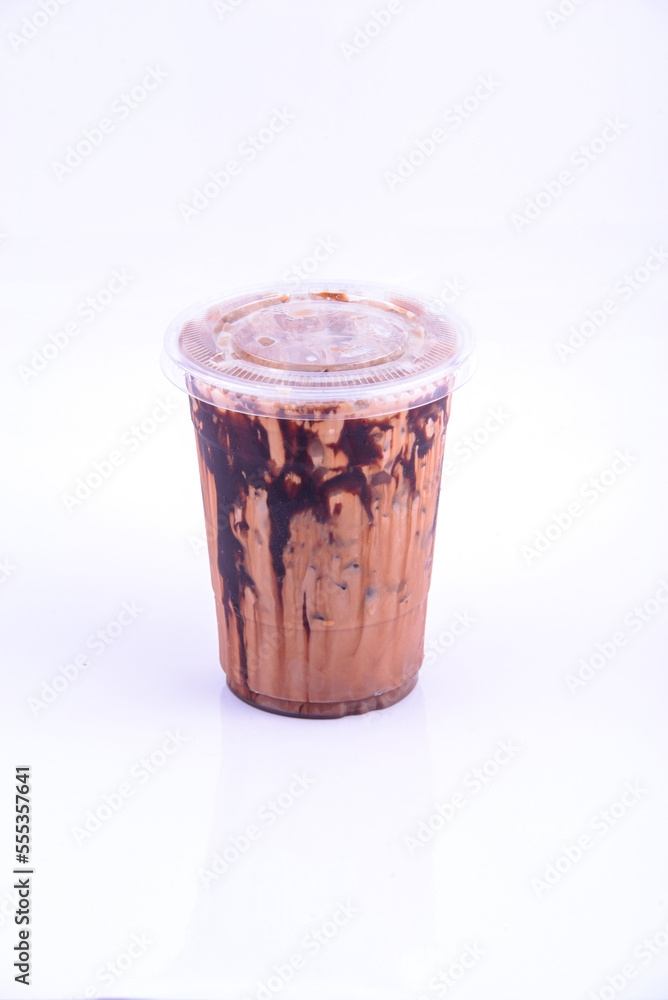 Mocha latte. Beverage for summer with brick wall background. Mocha latte. Beverage for summer with brick wall background.