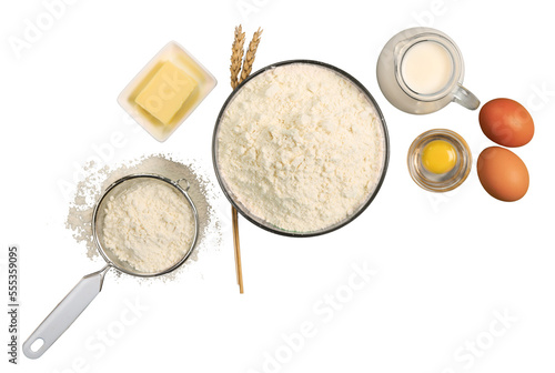 Collection of baking ingredients, flour, milk and eggs