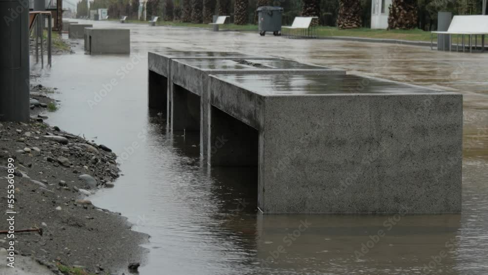 Rain on the embankment in Batumi. Rain beats on the roof and on the bench on the embankment. Rain on the boulevard in Batumi. Rain on the embankment in Batumi. Rain beats on the roof and on the bench on the embankment. Rain on the boulevard in Batumi.