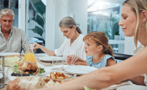 Family, holding hands or praying to God for food with mother, grandparents or girl child ready for dinner meal. Christmas, worship or spiritual Christian people with faith or prayer love eating lunch