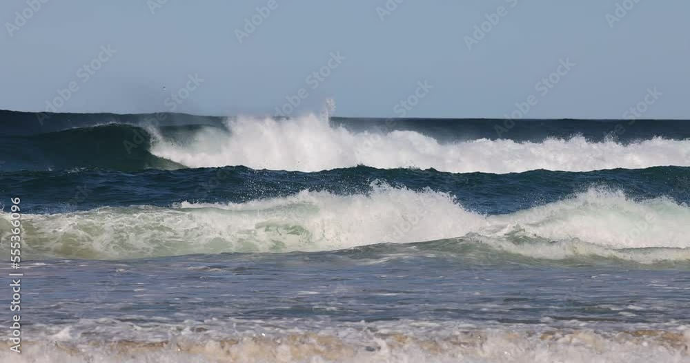 Bech scenes with ocean waves at a popular Australian beach in Gold Coast, Queensland, Australia. Bech scenes with ocean waves at a popular Australian beach in Gold Coast, Queensland, Australia.
