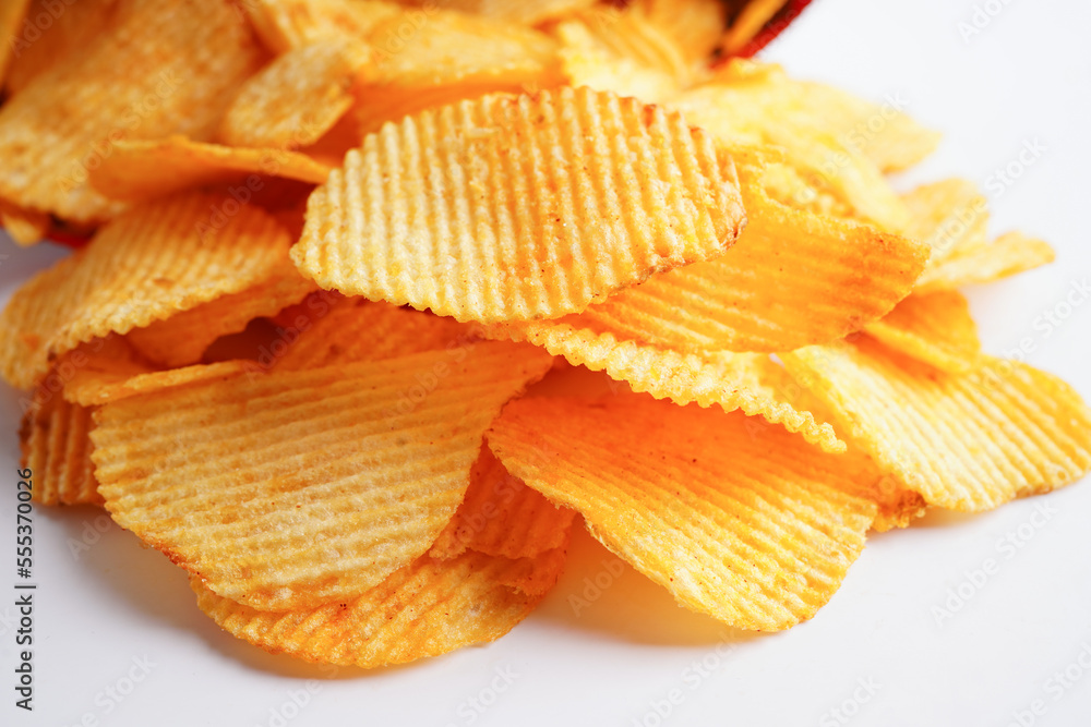 Potato chips in open bag, delicious BBQ seasoning spicy for crips, thin slice deep fried snack fast food. Potato chips in open bag, delicious BBQ seasoning spicy for crips, thin slice deep fried snack fast food.