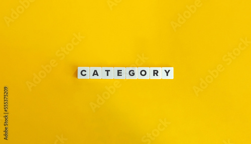Category Banner and Word on Block Letter Tiles on Yellow Background. Minimal Aesthetics. photo