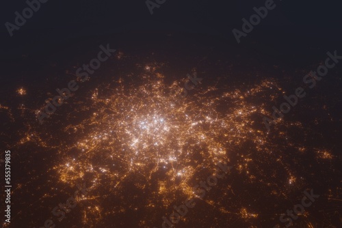 Aerial shot on Paris (France) at night, view from west. Imitation of satellite view on modern city with street lights and glow effect. 3d render