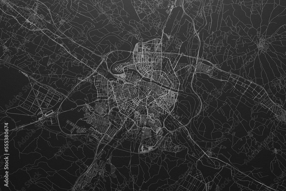 Street map of Zaragoza (Spain) on black paper with light coming from top