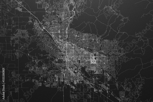 Street map of Tucson (Arizona, USA) on black paper with light coming from top