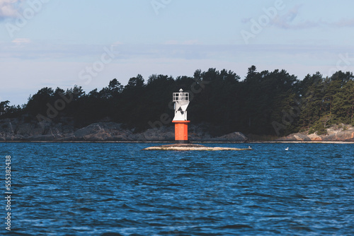 Archipelago National Park landscape, Southwest Finland, with islands, islets and skerries, Saaristomeren kansallispuisto, summer sunny day, view from shuttle ship ferry boat in the Archipelago Sea photo