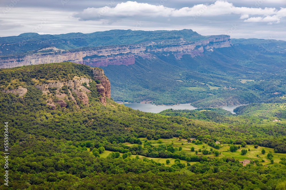 Obraz premium Aerial view of the Sau reservoir with the Collsacabra cliffs in the background. Guilleries Natural Park, Catalonia, Spain