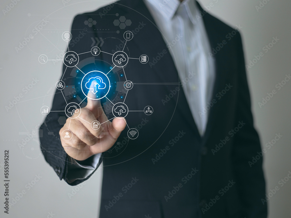 Obraz premium Hand touching infographic cloud computing and technology icons , cloud technology is centralise collect lifestyle and confidential information