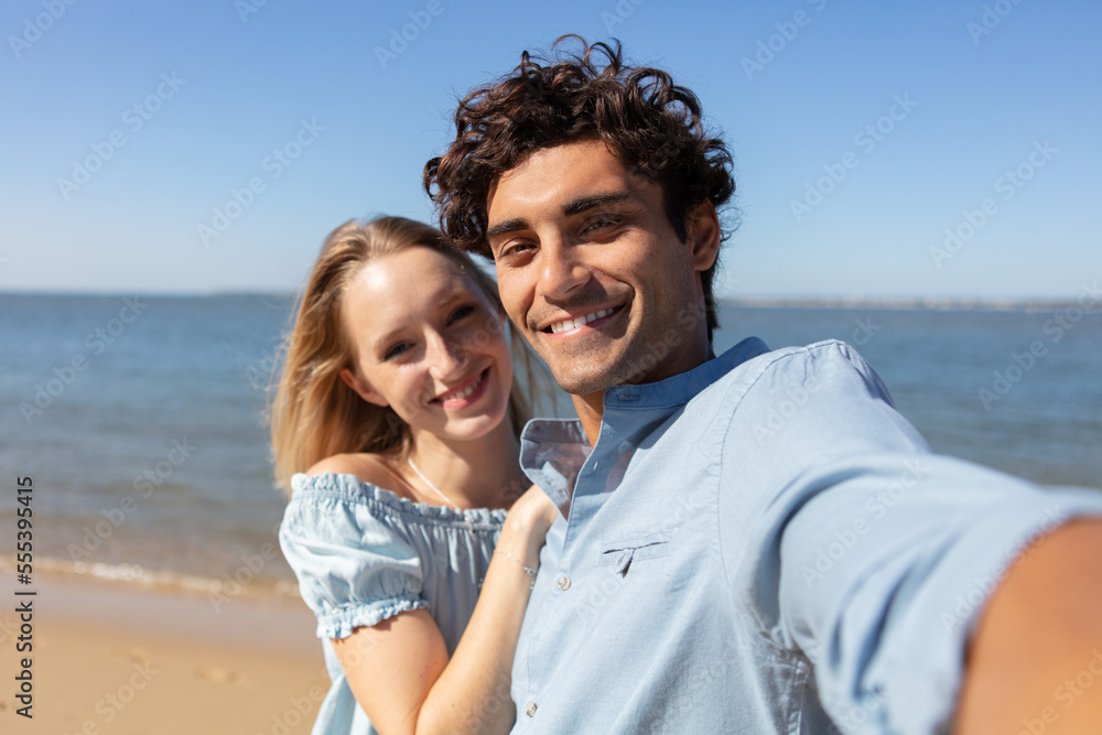 young couple making selfie photo at the beach young couple making selfie photo at the beach