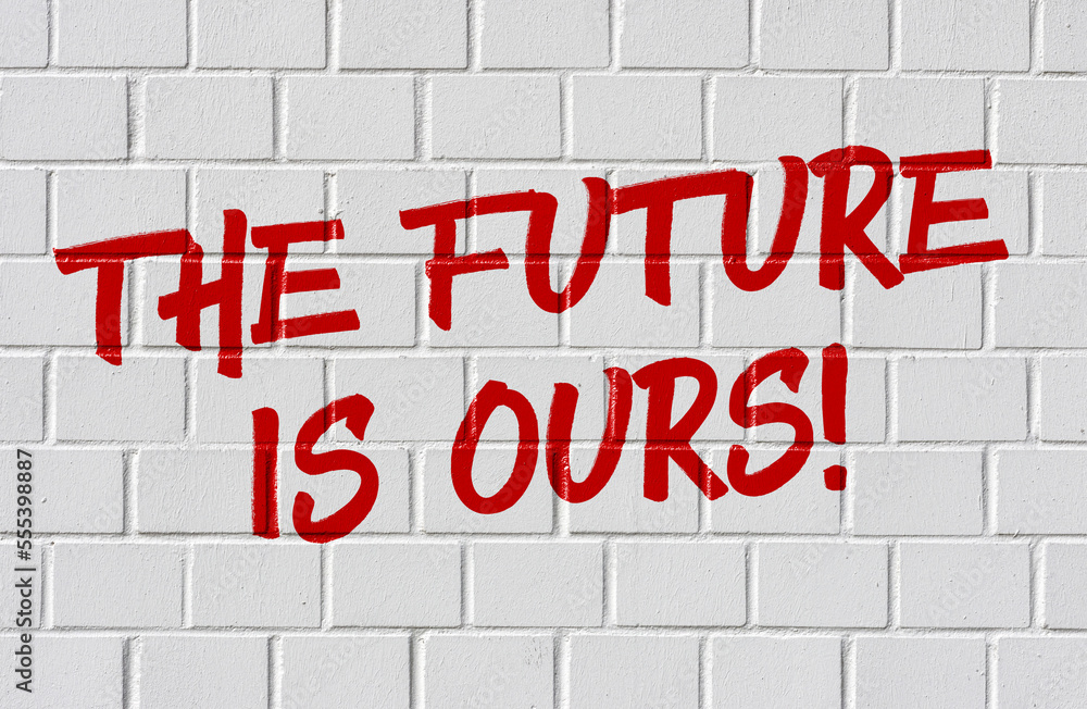 Graffiti on a brick wall - The future is ours Graffiti on a brick wall - The future is ours