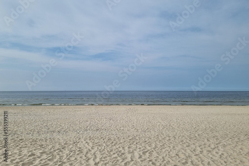 The sandy coast of the Baltic Sea. Rest on the sea.