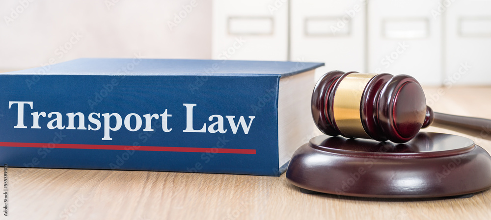 A law book with a gavel - Transport law
