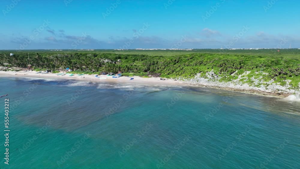 Beautiful tropical beach with palm trees. Clear turquoise sea water. Beautiful tropical beach with palm trees. Clear turquoise sea water.