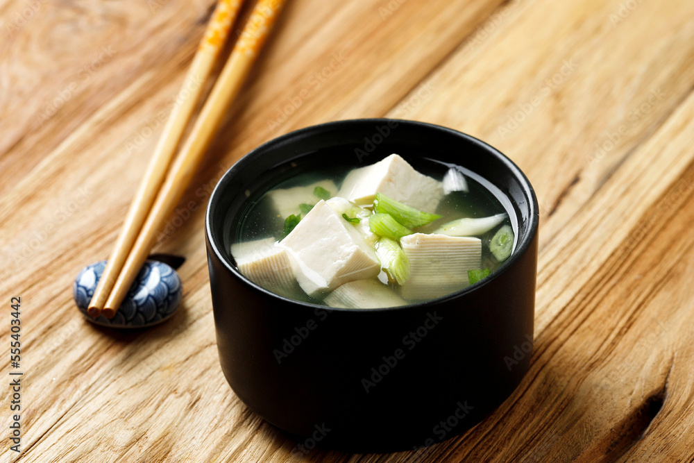 Japanese Miso Tofu Soup on Black Ceramic Bowl Japanese Miso Tofu Soup on Black Ceramic Bowl