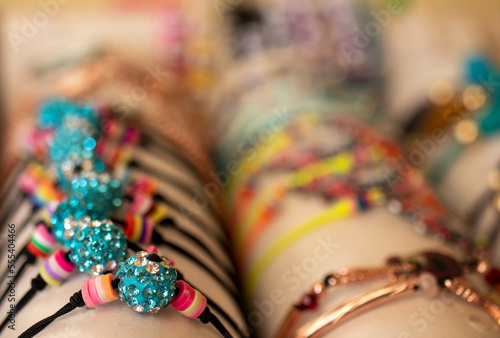Bracelets made of small blue beads, photograph taken with reduced depth of field.