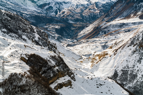 Snow capped mountains at winter season photo