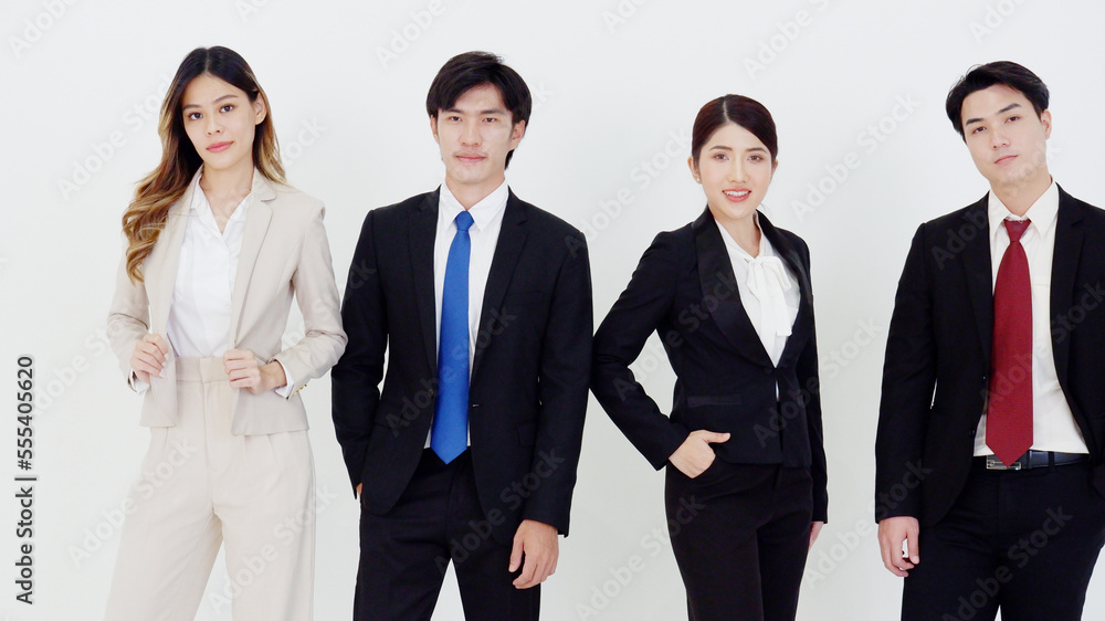 Business woman and business man standing smiling on a white background. Business woman and business man standing smiling on a white background.