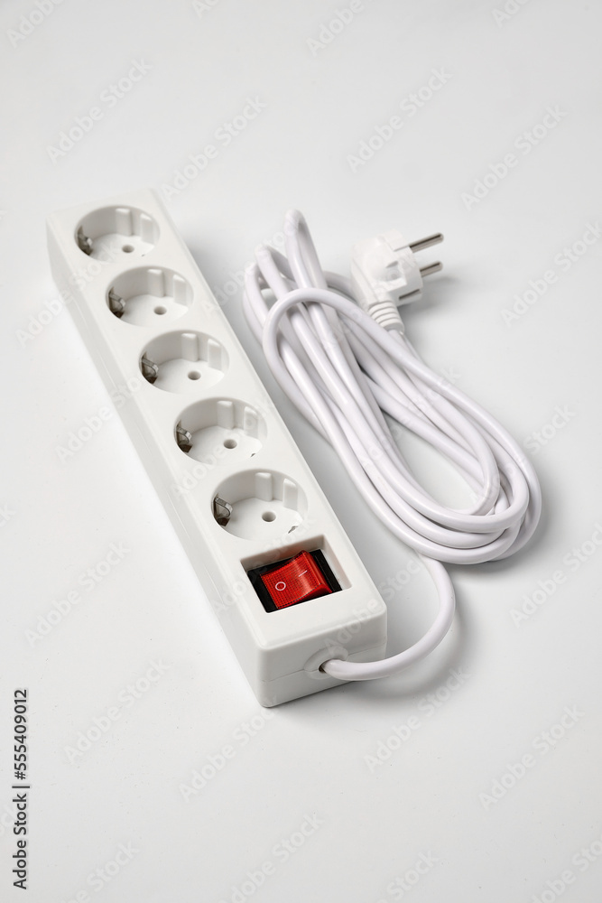 White extension cord for five sockets witn illuminated power circuit breaker White extension cord for five sockets witn illuminated power circuit breaker