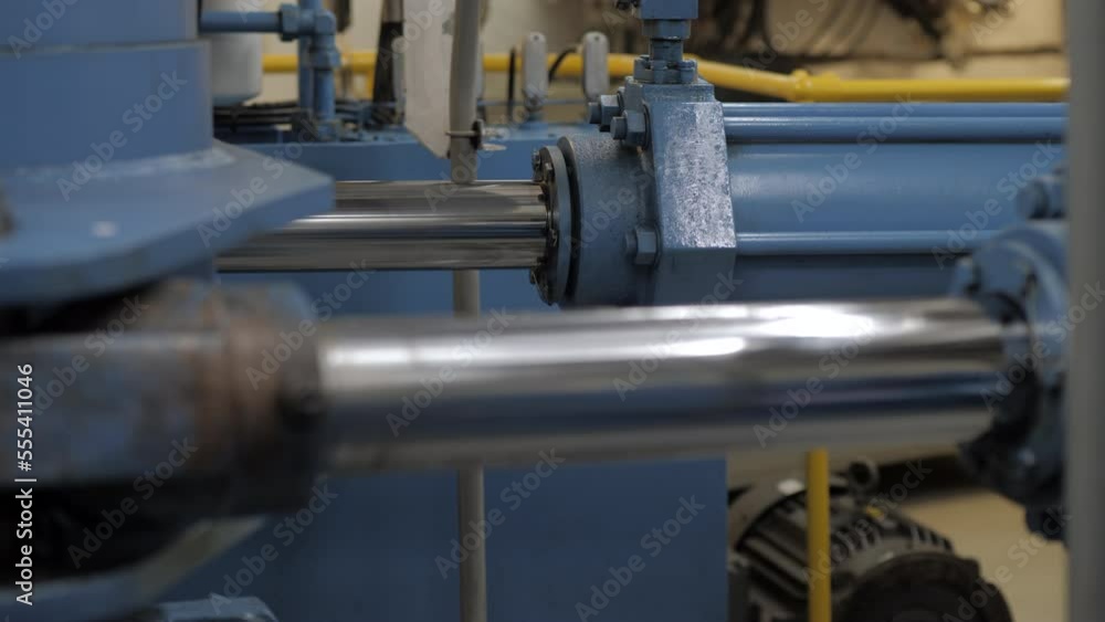 Pistons of hydraulic steering gear moves rudder arm Stock Video Adobe