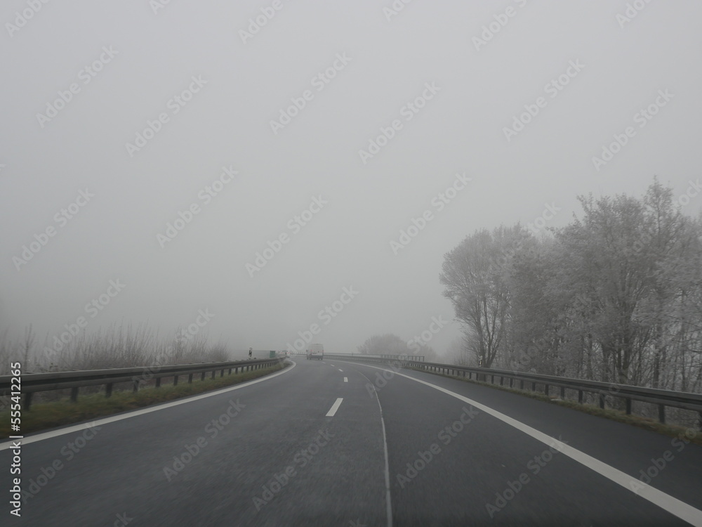 Fototapeta premium Highway in fog German Autobahn