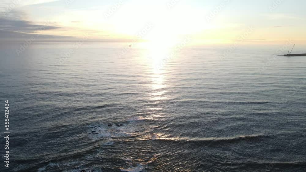 Sunset over the Atlantic Ocean, aerial view from Foz do Douro, Porto, Portugal