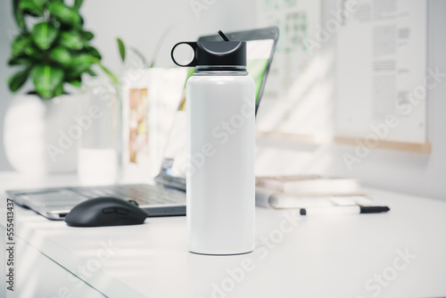 Water bottle on office desktop mockup. 3D rendering photo