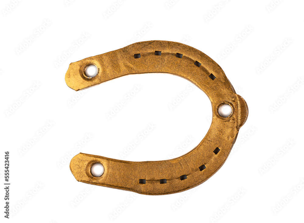 Real horseshoe painted with bronze paint isolated on a white background. Real horseshoe painted with bronze paint isolated on a white background.