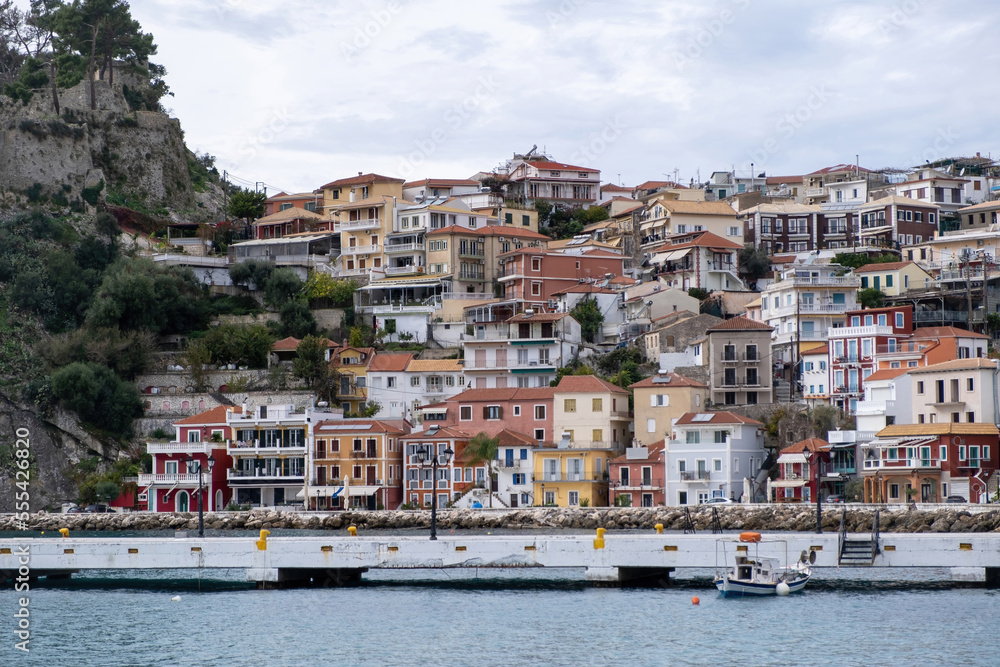 Obraz premium Parga, Greece. Traditional Ionian coast city colorful facade buildings and the Venetian Castle