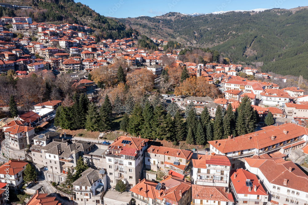 Metsovo village, Epirus Greece. Aerial drone view of traditional red tile roof house on the mountain.
