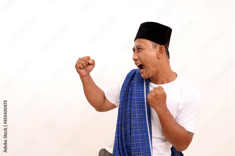 Portrait of happy Asian man celebrates his success. Isolated on white background Portrait of happy Asian man celebrates his success. Isolated on white background