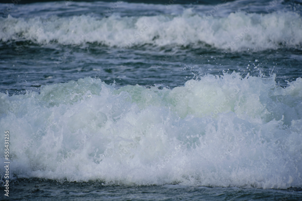 Surf wave with foam splashes on sea. Surf wave with foam splashes on sea.
