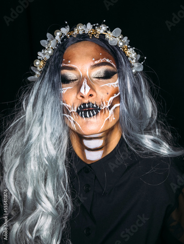 portrait of a person with a mask. Halloween make up. Makeup. Halloween.