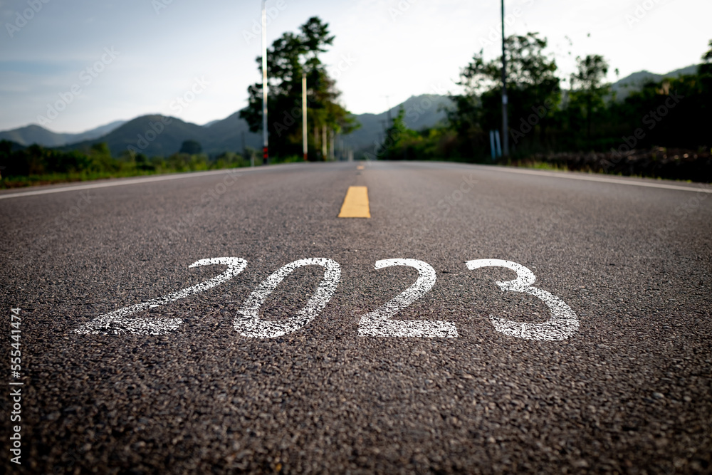 Obraz premium The word 2023 is written on an empty road. , Concept of New year 2023.