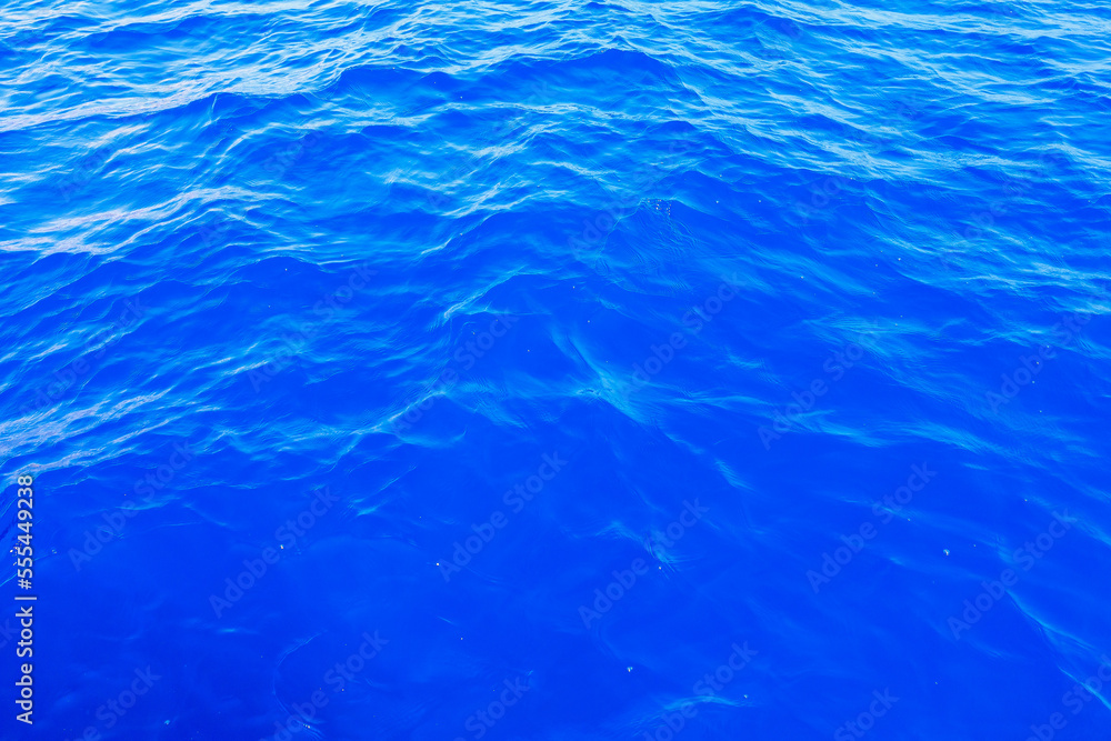 Very nice sea water background or backdrop with selective focus. Small waves of natural water surface texture. Very nice sea water background or backdrop with selective focus. Small waves of natural water surface texture.
