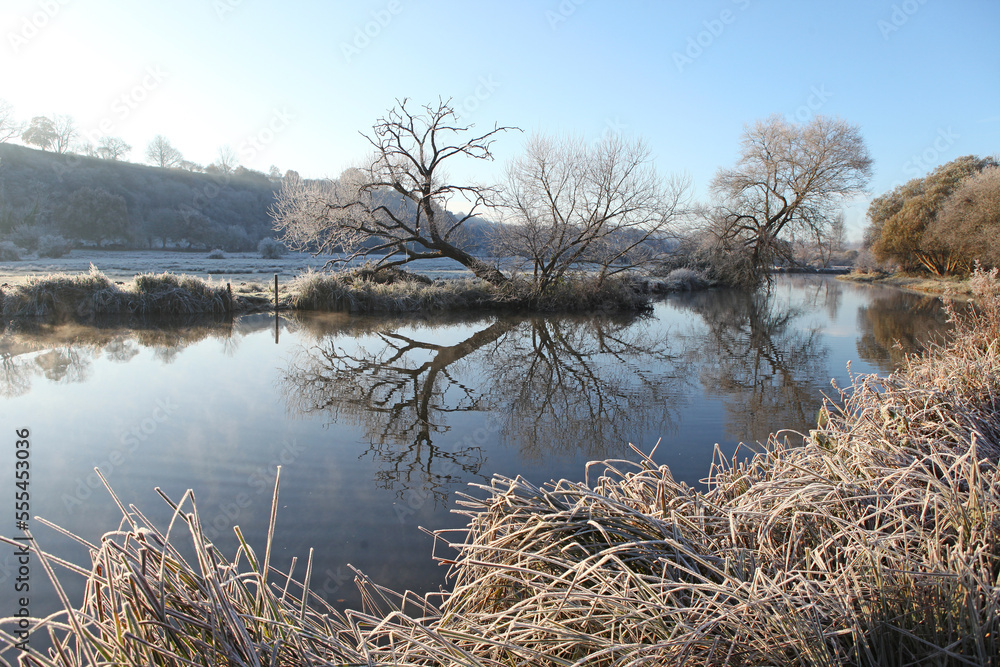 Winter reflections on the River Wey on a cold and frosty day. Winter reflections on the River Wey on a cold and frosty day.
