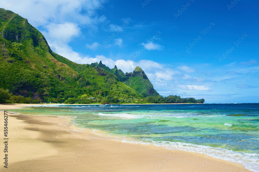 View Of The Coastline Of Kauai With Rugged, Green Mountains And A Sand Beach; Wailua, Kauai, Hawaii, United States Of America View Of The Coastline Of Kauai With Rugged, Green Mountains And A Sand Beach; Wailua, Kauai, Hawaii, United States Of America