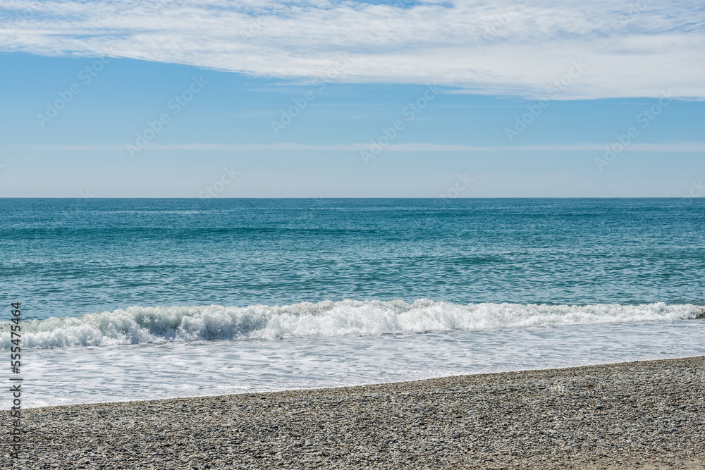 The blue-coloured Tasman Sea and the blue sky at Ship Creek, West Coast; South Island, New Zealand The blue-coloured Tasman Sea and the blue sky at Ship Creek, West Coast; South Island, New Zealand