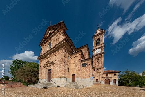 Sommariva del Bosco, Cuneo, Italy - May 01, 2022: Parish church of Santi Giacomo e Filippo (18th century) with the bell tower with clock photo