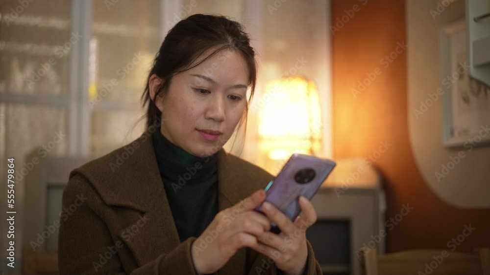 young female using mobile phone young female using mobile phone