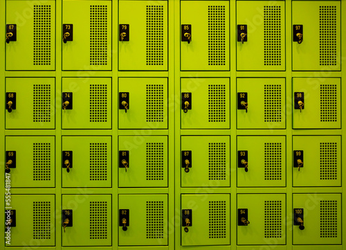 Green lockers in 4 rows, with locks and keys; Lugano, Ticino, Switzerland photo