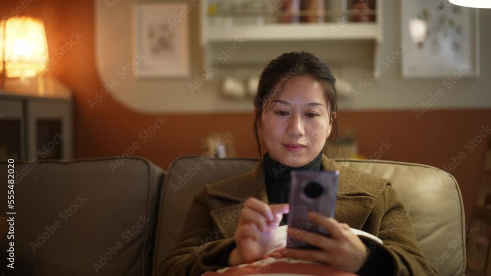 young female using mobile phone young female using mobile phone